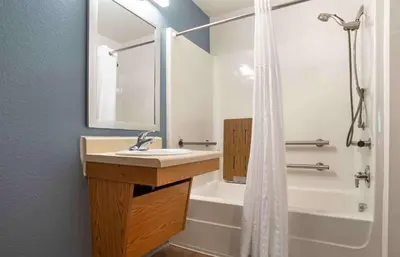 a bathroom with a sink and a shower at Extended Stay America Select Suites - Cleveland - Avon in Avon