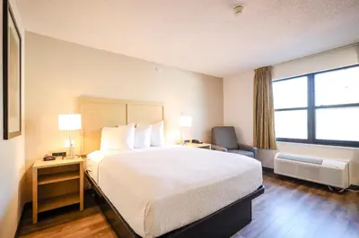 a hotel room with a bed and a window at Extended Stay America Suites - Cleveland - Beachwood - Orange Place - South in Orange