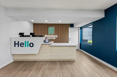 an office with a hello sign on a counter at MainStay Suites Columbus North - Worthington in Columbus