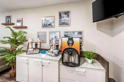 a coffee shop with a coffee maker on a counter at WoodSpring Suites Columbus West - Hilliard in Hilliard