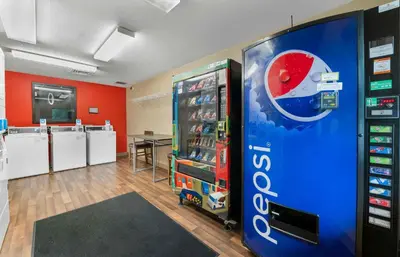 a store with a soda machine in a room at Extended Stay America Suites - Cincinnati - Springdale - I-275 in Springdale