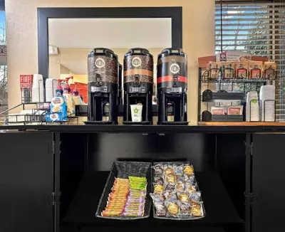 a shelf with drinks and snacks on it at Extended Stay America Suites - Cincinnati - Springdale - I-275 in Springdale