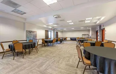 a large room with tables and chairs and a classroom at Extended Stay America Premier Suites - Cleveland - Independence in Independence