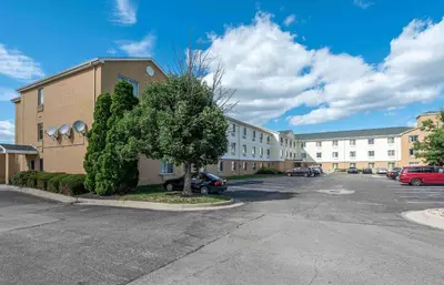 an empty parking lot in front of a building at Extended Stay America Suites - Cincinnati - Blue Ash - Kenwood Road in Blue Ash