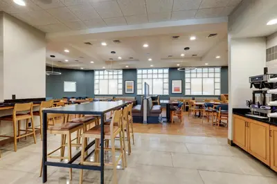 a large dining room with tables and chairs at Drury Inn & Suites Dayton North in Dayton