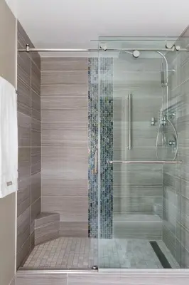 a shower with a glass door in a bathroom at The Westin Great Southern Columbus in Columbus