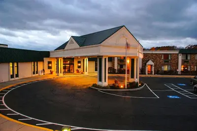 a building with a parking lot in front of it at Quality Inn & Suites Richfield in Richfield