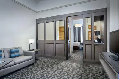 a living room with a couch and a television at Hyatt Regency Cleveland at The Arcade in Cleveland