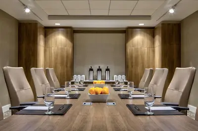 a conference room with a long table with a bowl of fruit at Hyatt Regency Cleveland at The Arcade in Cleveland