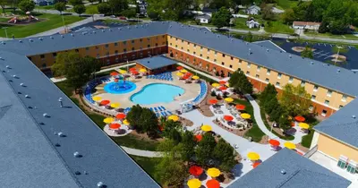 an aerial view of a hotel with a swimming pool at Cedar Point's Express Hotel in Sandusky