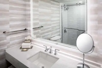 a bathroom with a sink and a mirror at Hyatt Regency Columbus in Columbus