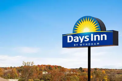 a sign for a days inn by windham at Days Inn by Wyndham Hillsboro in Hillsboro
