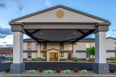 a rendering of a hotel with a large building at Days Inn by Wyndham Grayson in Grayson