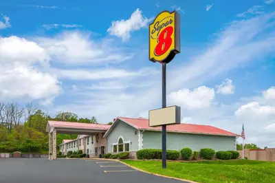 a sign in front of a fast food restaurant at Super 8 by Wyndham Mt. Vernon in Mount Vernon