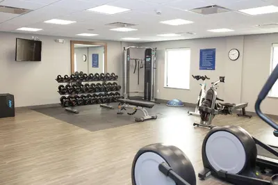 a gym with a lot of exercise equipment at Hampton Inn and Suites Dundee in Dundee