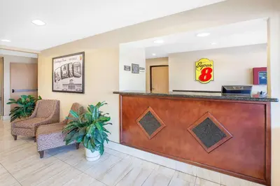 a lobby of a hospital with a reception desk at Super 8 by Wyndham Seville in Seville
