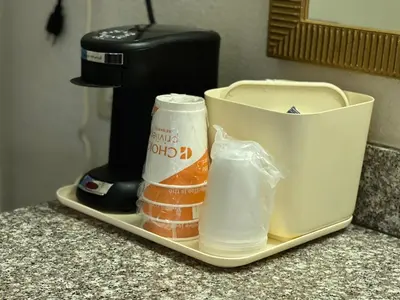 a counter top with a coffee maker and a mixer at Quality Inn Maysville in Maysville
