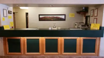 a counter in a hospital room with a counter top at Super 8 by Wyndham Wheeling WV in Wheeling