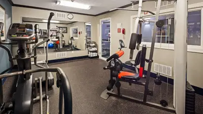 a gym with cardio equipment in a building at Best Western Elyria in Elyria