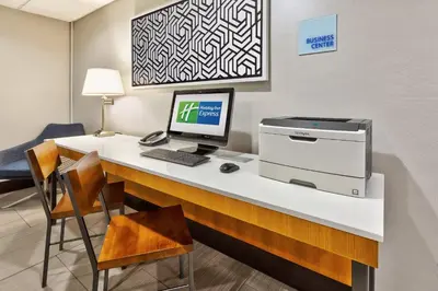 a room with a desk with a computer and a printer at Holiday Inn Express Chillicothe East by IHG in Chillicothe