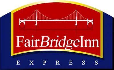 a label with the golden gate bridge in red and blue at FairBridge Inn Express North Lima in North Lima