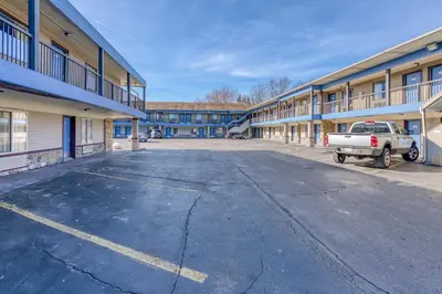 an empty parking lot in front of a building at FairBridge Inn Express North Lima in North Lima