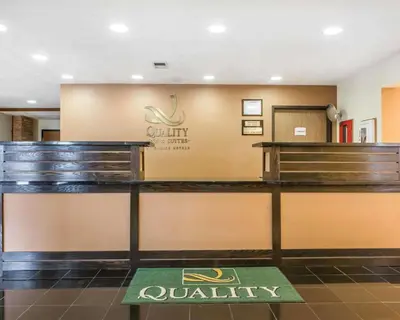 a calligraphy sign on the front of a waiting room at Quality Inn St Marys in Villa Nova