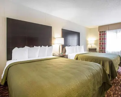 a hotel room with two beds in a room at Quality Inn St Marys in Villa Nova