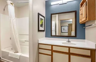 a bathroom with a sink and a mirror at Extended Stay America Suites - Cincinnati - Blue Ash - Reed Hartman in Blue Ash