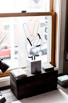 a statue of a rabbit on a table in front of a window at The Loft in Granville