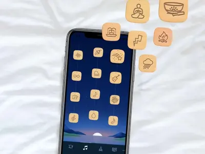 an iphone laying on a bed with icons on it at Sleep Inn & Suites Moundsville - Wheeling in Moundsville