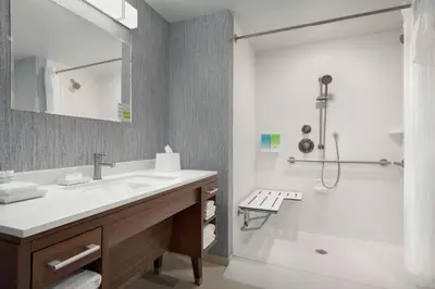 a bathroom with a sink and a shower at Home2 Suites By Hilton Dayton/Beavercreek, Oh in Beavercreek