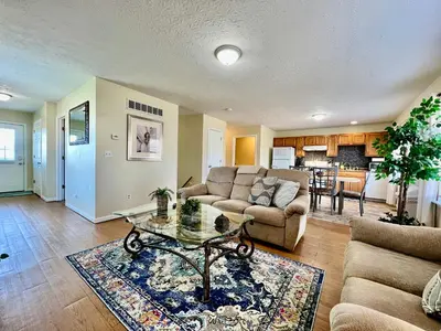 a living room with a couch and a table at Jason's Attached Home in Monroe