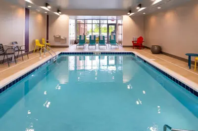 a large pool with blue water in a hotel room at Home2 Suites By Hilton Columbus/West, OH in Columbus