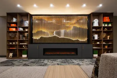 a fireplace in a living room with a fire place at Sheraton Suites Columbus Worthington in Columbus