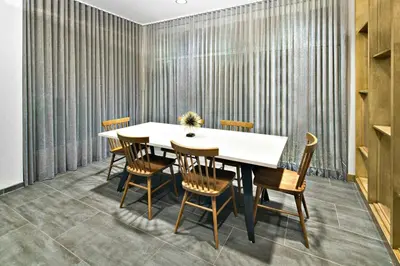 a dining room with a table and chairs at Fairfield Inn & Suites Columbus New Albany in New Albany