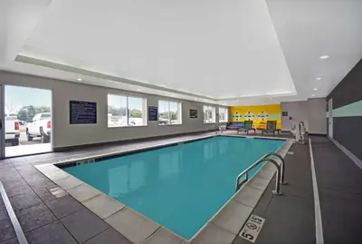 a large swimming pool in a hotel room at Tru By Hilton Monroe, MI in Monroe