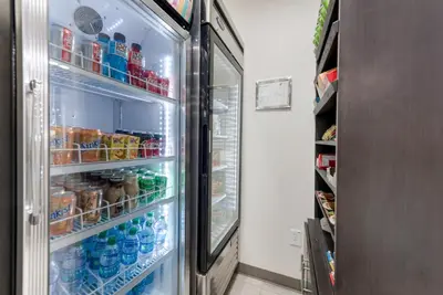 a refrigerator filled with lots of food and drinks at Holiday Inn Express - Columbus Downtown by IHG in Columbus