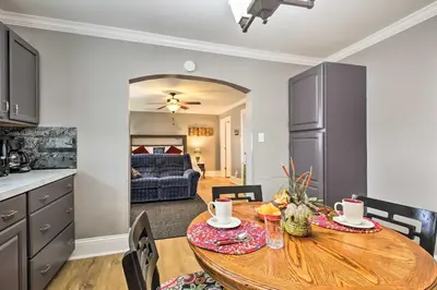 a kitchen and dining room with a table and chairs at Modern Studio Apartment in Central Williamstown! in Williamstown