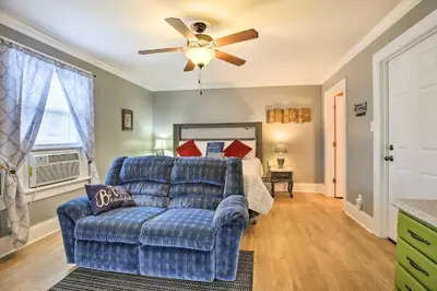 a living room with a couch and a bed at Modern Studio Apartment in Central Williamstown! in Williamstown