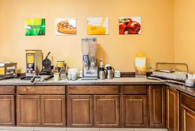 a kitchen with a counter with a blender on it at Wingate by Wyndham Marietta Conference Center Ohio in Marietta