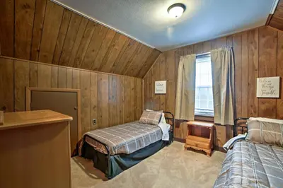 a bedroom with two beds and a window in it at Burgettstown Home - 7 Mi to KeyBank Pavilion in Burgettstown