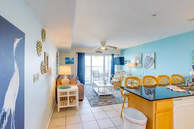 a kitchen and living room with a couch and a table at Waterfront Middle Bass Condo with Pool Access! in Put-in-Bay