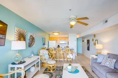 a living room with a couch and a table at Waterfront Middle Bass Condo with Pool Access! in Put-in-Bay