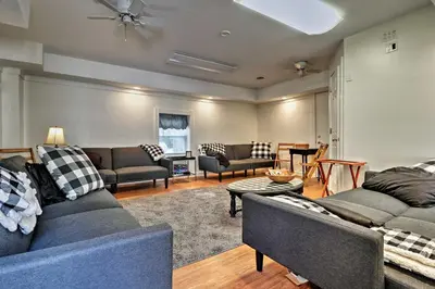 a living room with couches and chairs and a table at Ottawa Lake Home with BBQ and Patio, 15 Mi to Toledo in Sylvania