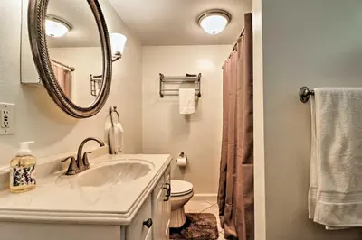 a bathroom with a sink and a mirror at Ottawa Lake Home with BBQ and Patio, 15 Mi to Toledo in Sylvania