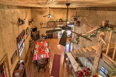 an overhead view of a restaurant with a table and chairs at The Bovard Lodge Rustic Cabin Near Ohio River! in Florence