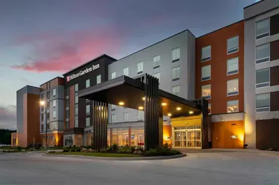 a rendering of a hospital building at night at Hilton Garden Inn By Hilton Fort Wayne North in Sunnybrook Acres