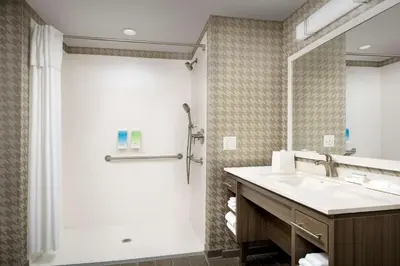 a bathroom with a sink and a shower at Home2 Suites By Hilton Marysville in Marysville