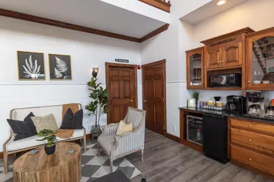a living room with a couch and a table at Hillside Villa Ohio in Millersburg